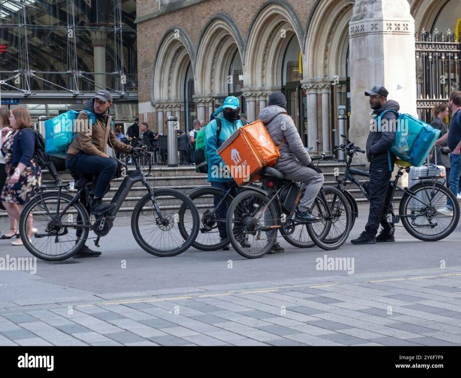 just-eat-and-deliveroo-food-delivery-couriers-e-bikes-congregate-at-liverpool-street-station-before-lunchtime-rush-2Y6F7F9.thumb.jpg.4faec1bb9d3d389411524b57841d8dd0.jpg